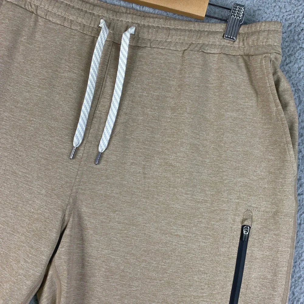 Vuori Sunday Performance Jogger Pants Mens XL Tan Heathered Tapered Stretch Knit